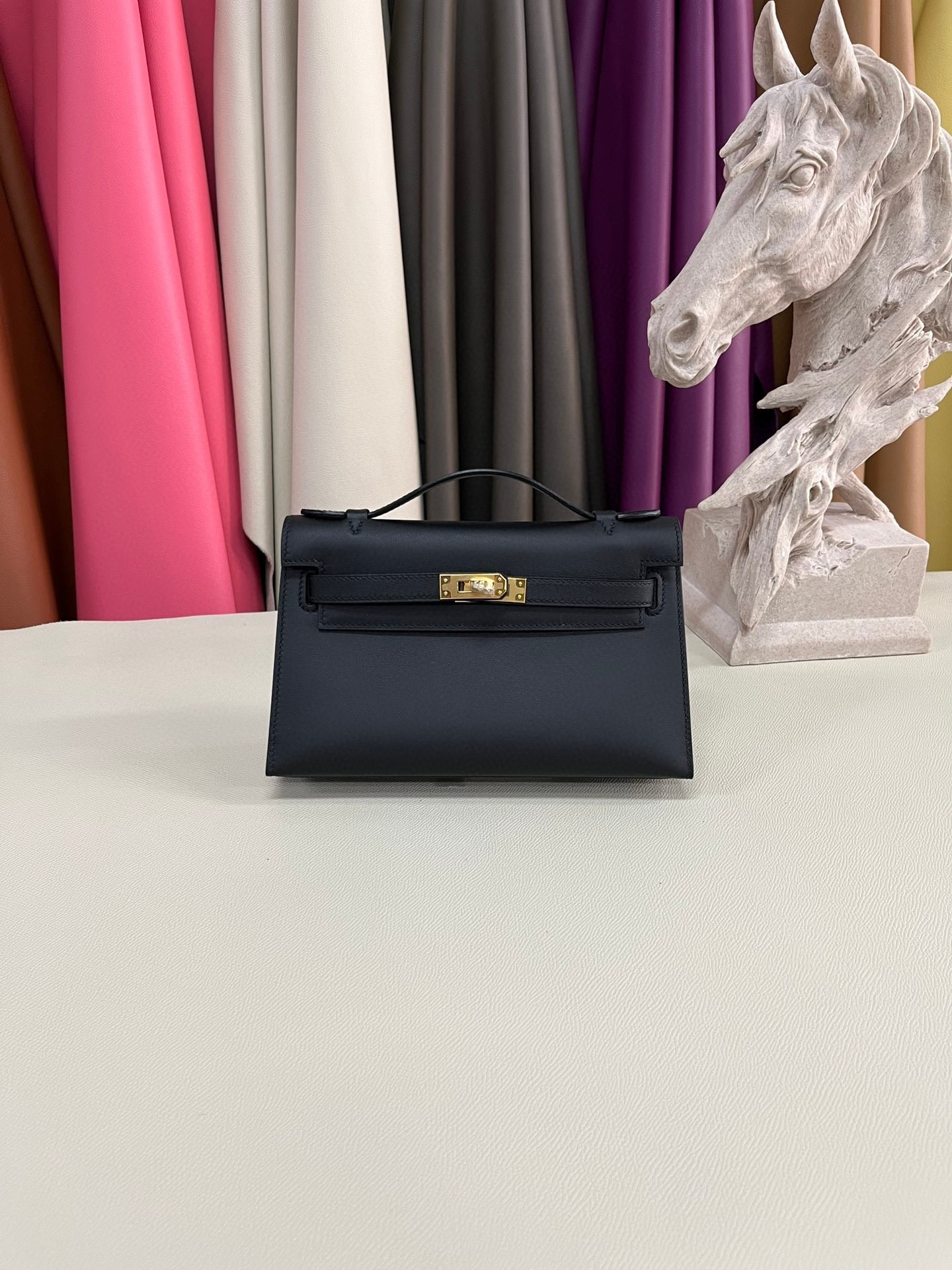 H**mes kelly pochette