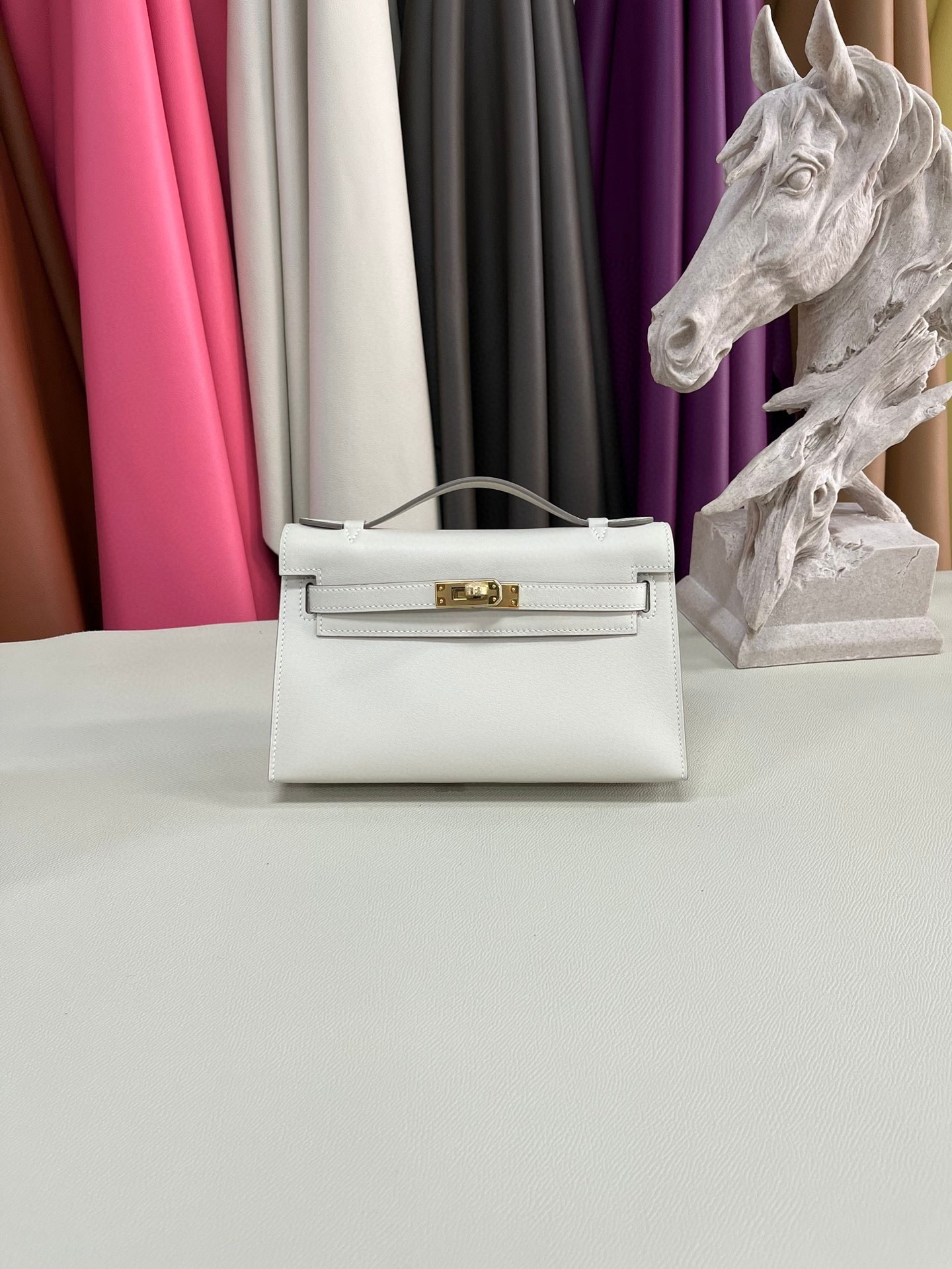 H**mes kelly pochette